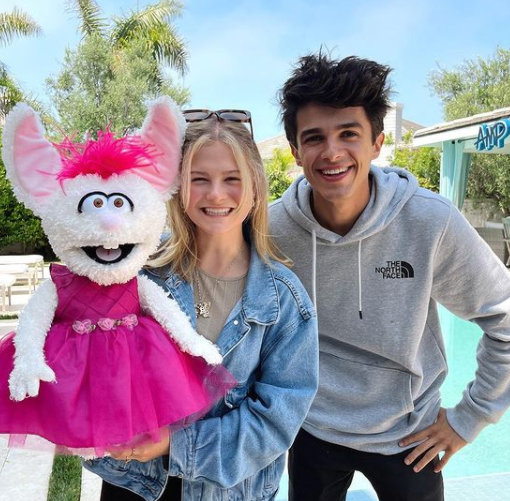 Darci Lynne Farmer with her brother and puppet