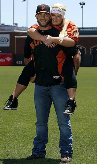 Madison Bumgarner carrying his wife Ali