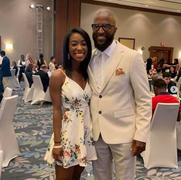 Aaryn Smiley clicking photo with her father Rickey Smiley